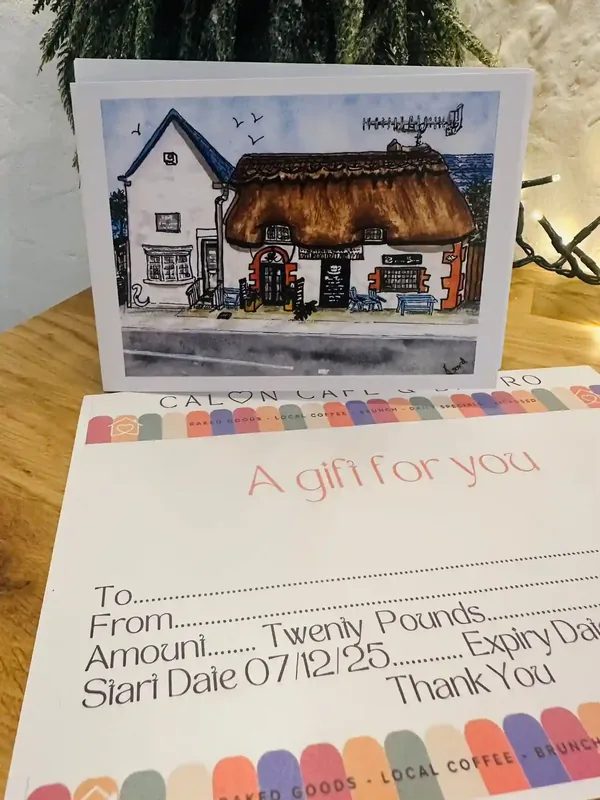 Calon Cafe & Bistro gift voucher alongside a Cafe illustrated card